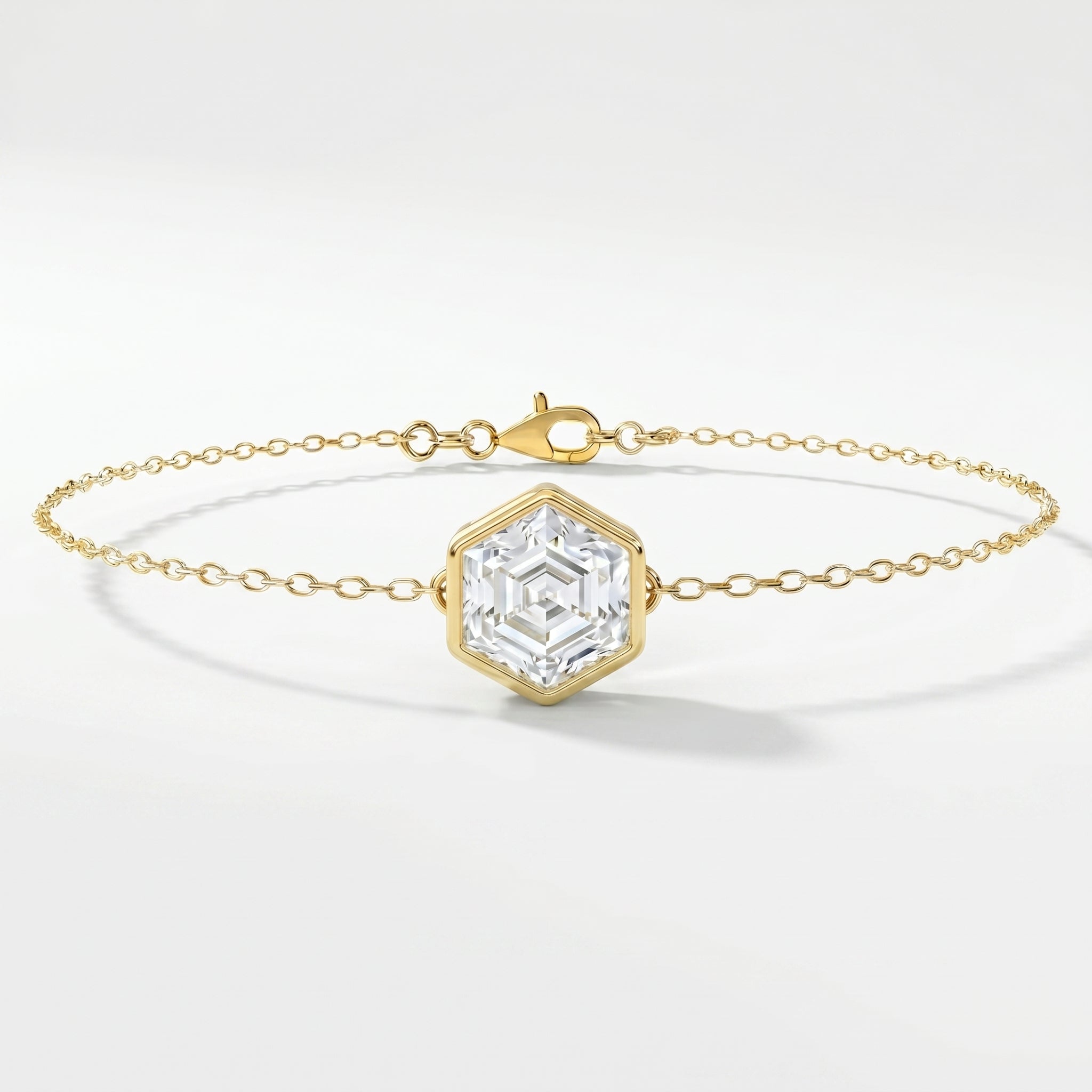 Minimalist gold bracelet with hexagon crystal gemstone in bezel setting on delicate chain jewelry