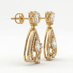 Side view of yellow gold pear diamond drop earrings showing secure setting and detailed pavé workmanship