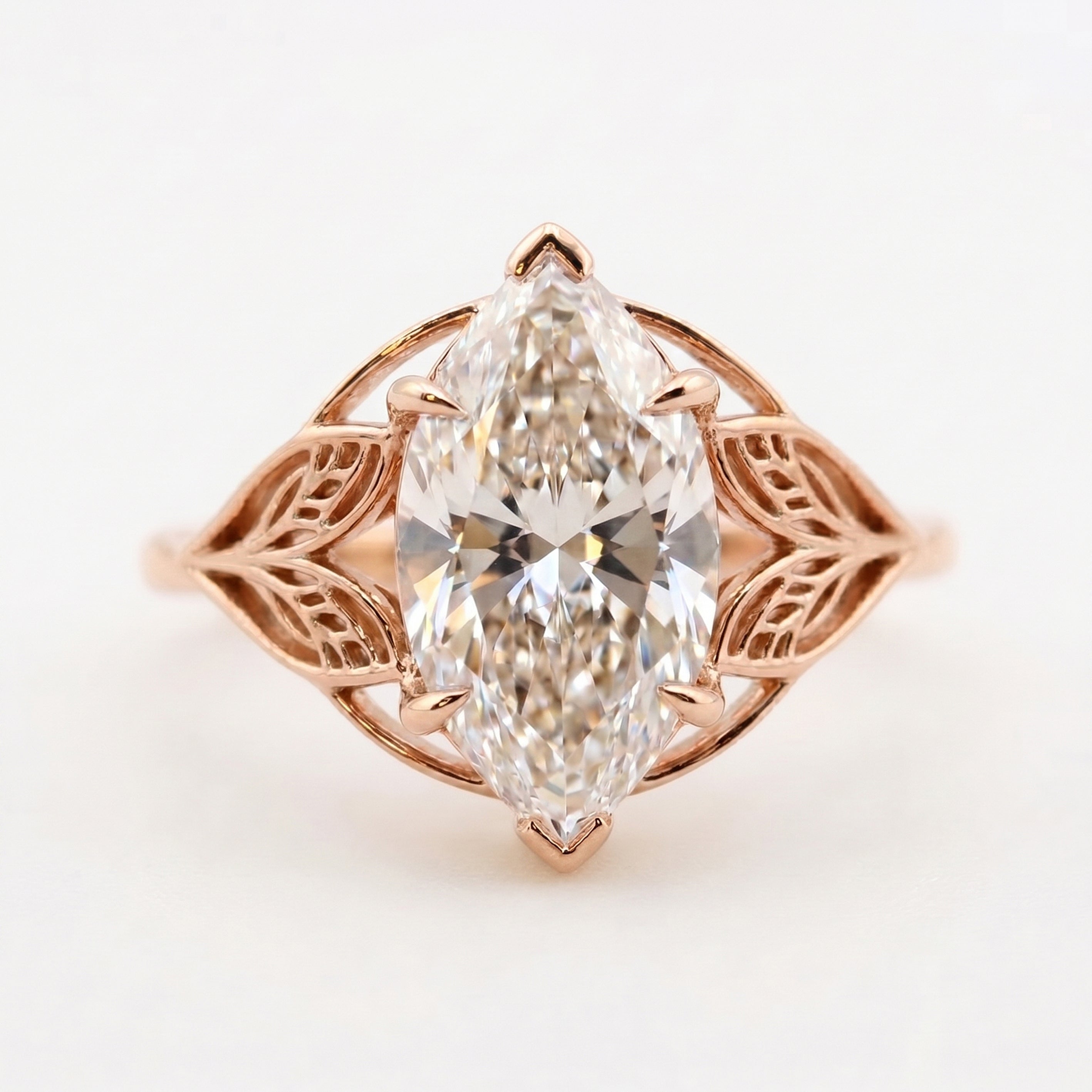 Solitaire Leaf Design Marquise Cut Diamond Engagement Ring