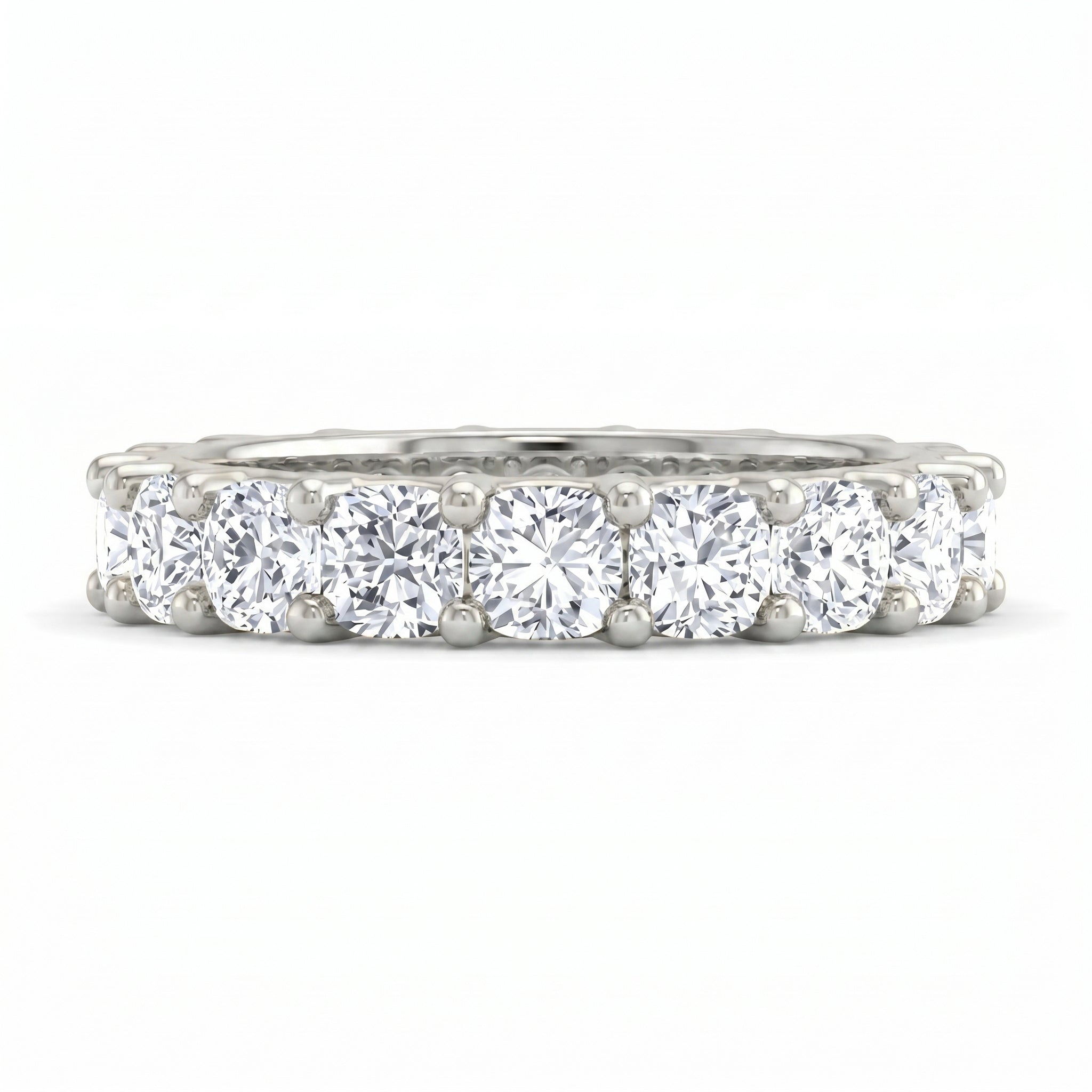 Diamond ring with multiple stones on a white background