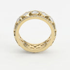 Luxury yellow gold diamond eternity band with round and princess cut diamonds, wide statement ring on white background