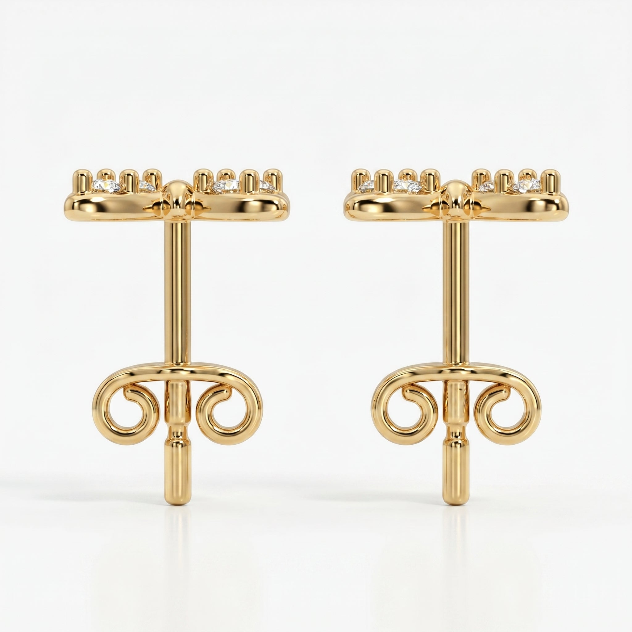 Macro close-up of pavé diamonds on butterfly stud earrings with high-polish luxury gold finish