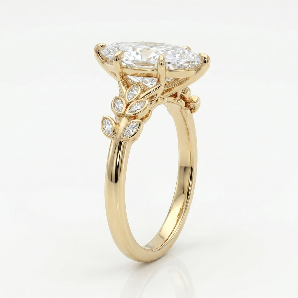 Luxury marquise cut diamond engagement ring with yellow gold botanical band shown at a 45 degree angle