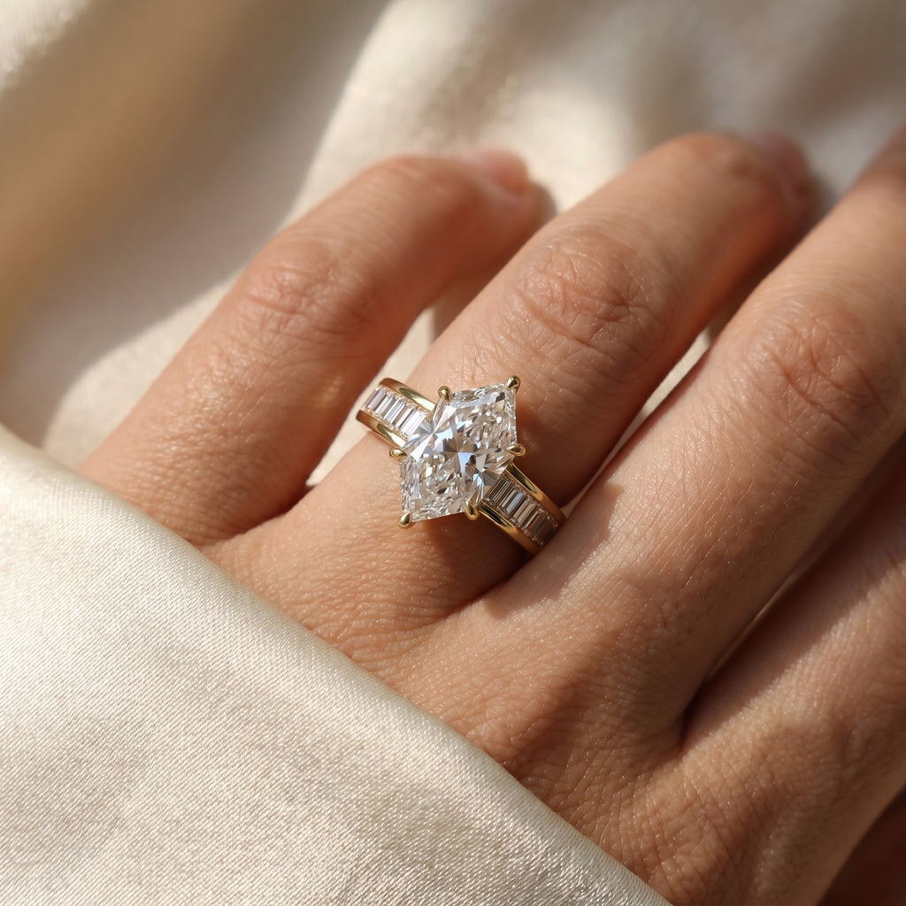Marquise diamond engagement ring worn on hand showing elegant finger coverage and luxury bridal style