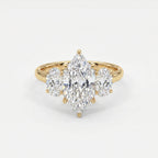 Marquise diamond three-stone engagement ring with oval side diamonds in polished yellow gold setting