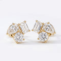 Minimalist diamond cluster stud earrings worn on ear in elegant everyday luxury styling