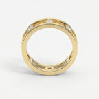 Modern open frame diamond band ring with bezel set diamonds in polished precious metal on white background