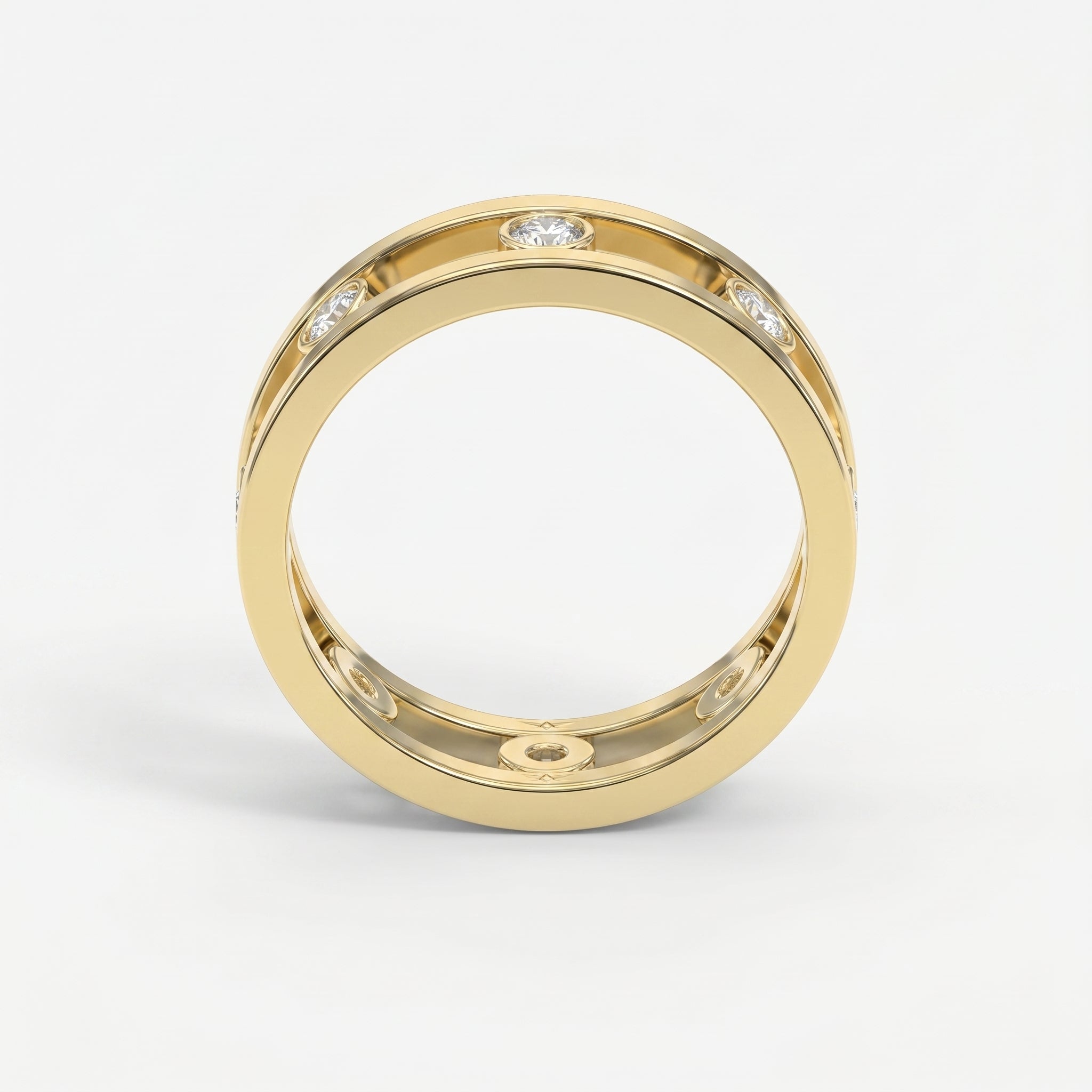 Modern open frame diamond band ring with bezel set diamonds in polished precious metal on white background