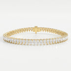 Pear-cut diamond tennis bracelet in yellow gold with elegant shared-prong setting and secure box clasp