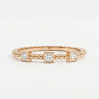 Close-up of princess-cut diamonds and beaded gold texture showing sparkle, craftsmanship and luxury detail
