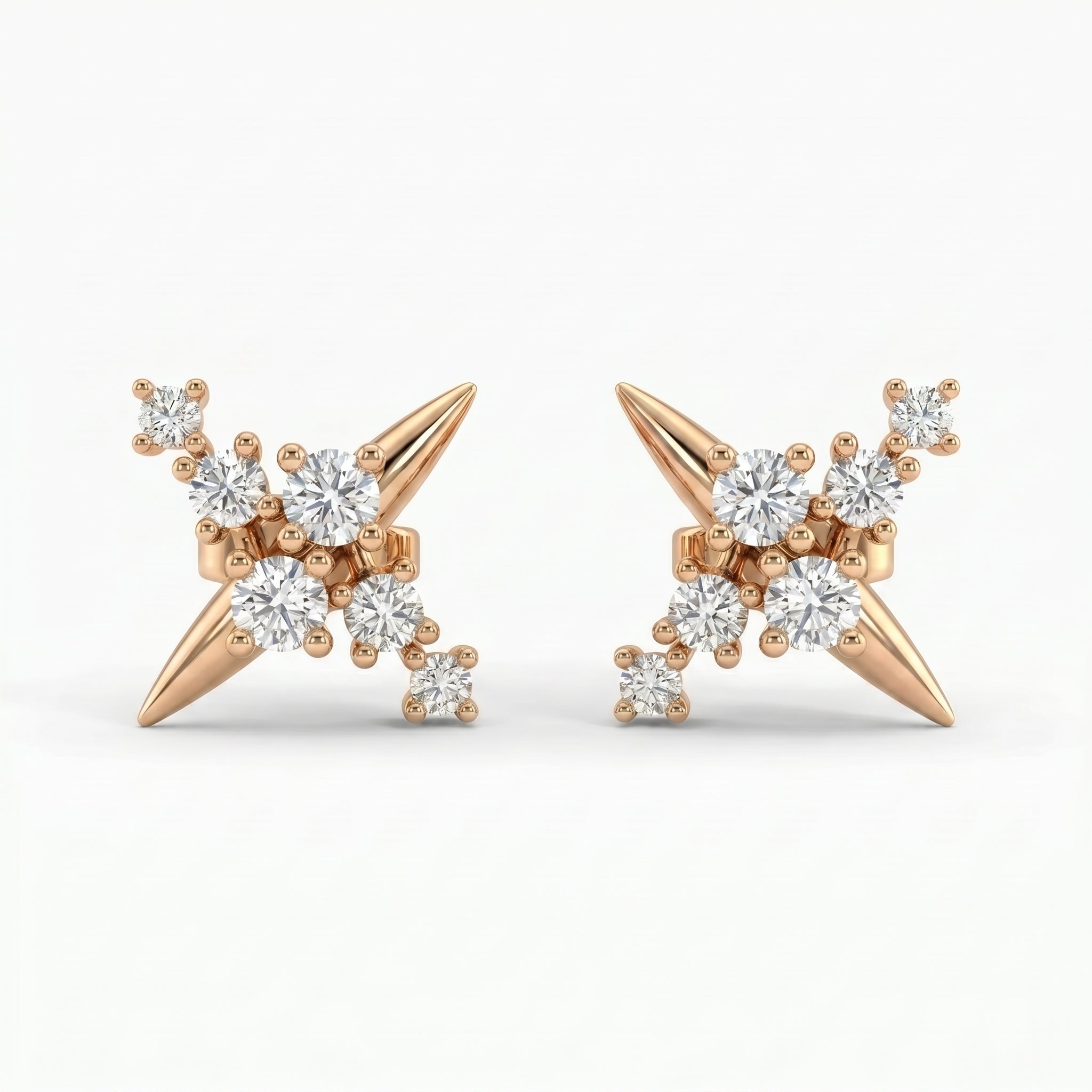 Rose gold diamond starburst stud earrings with clustered round diamonds and modern spike design on white background