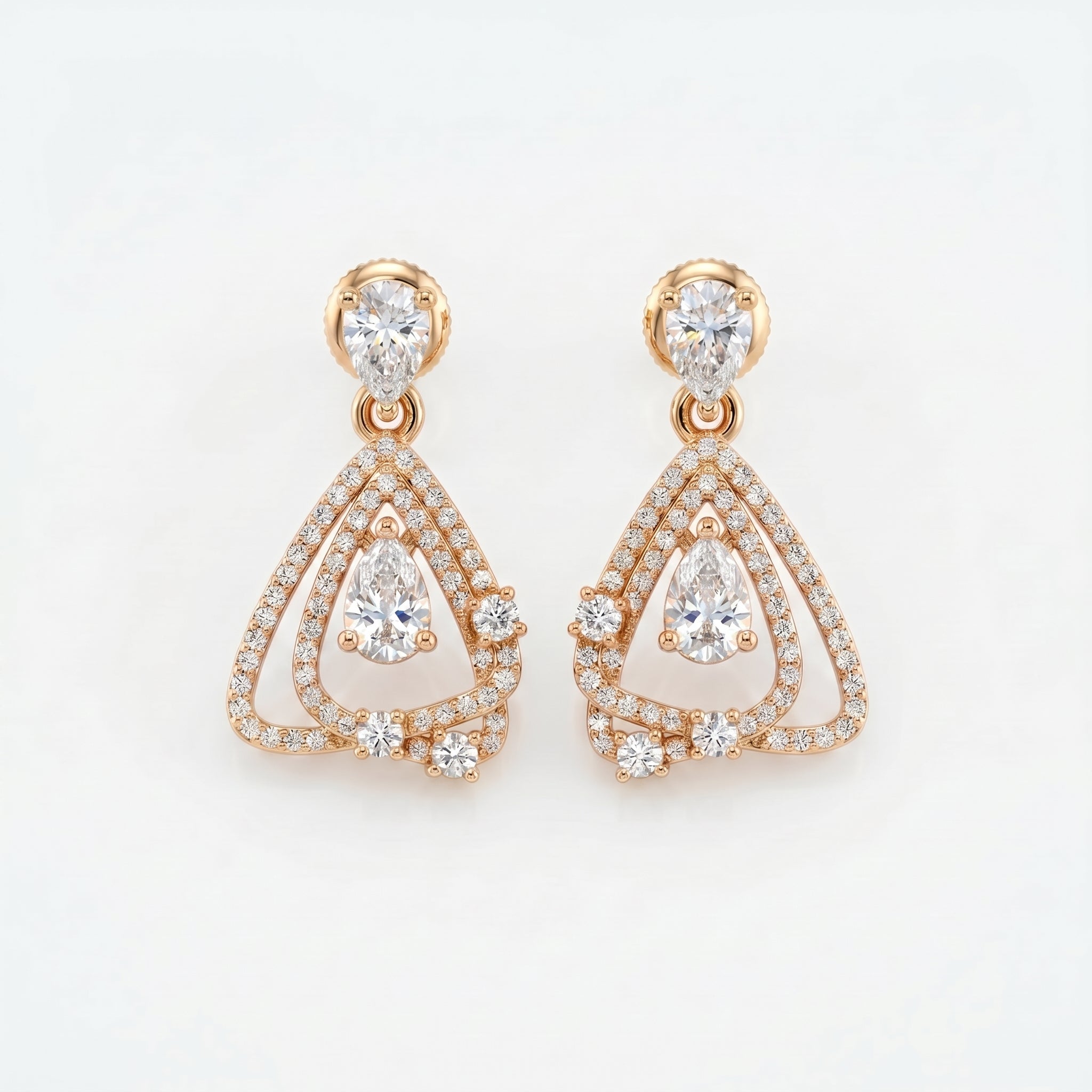 Rose gold pavé drop earrings with pear-cut stones and geometric open frame design on white background.