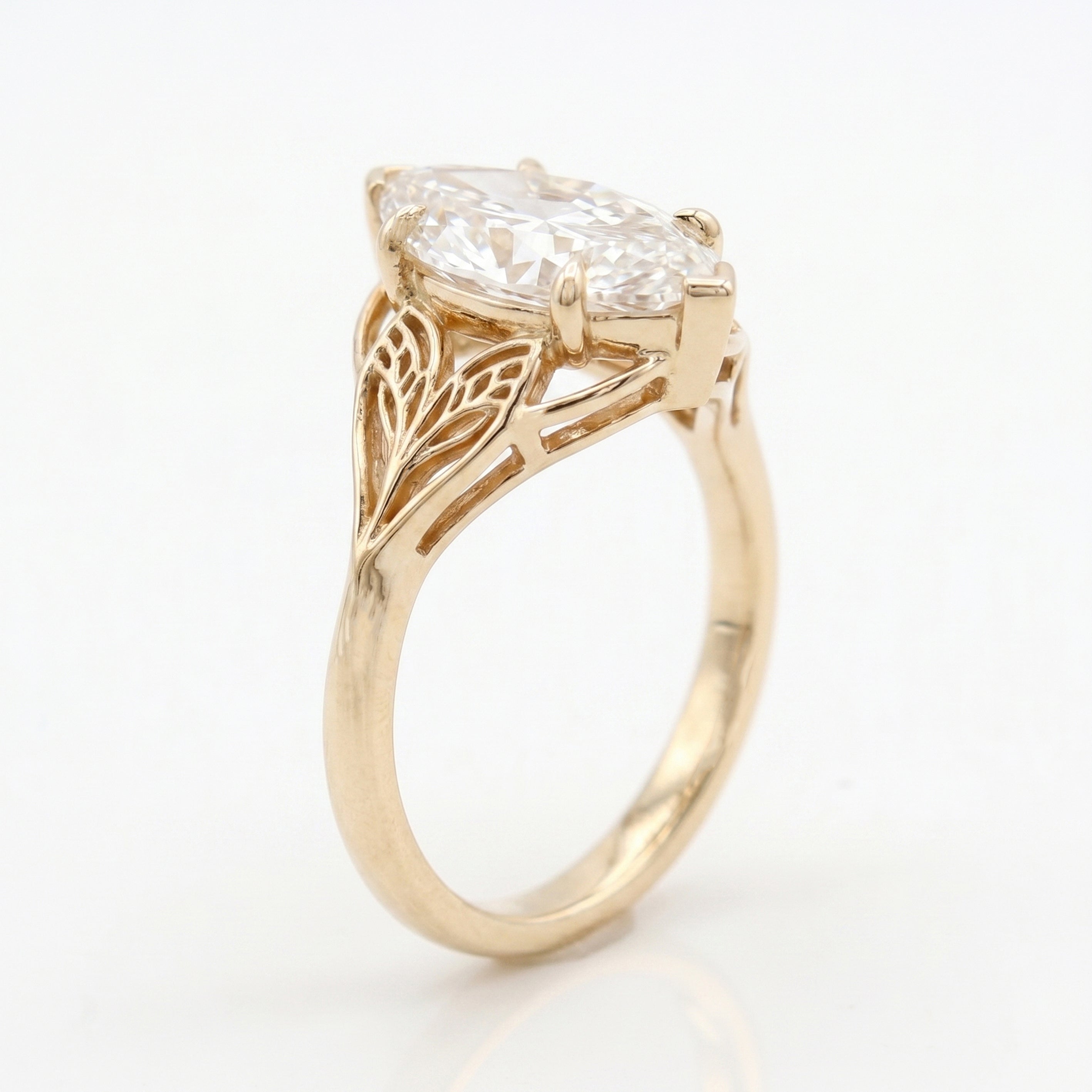 Solitaire Leaf Design Marquise Cut Diamond Engagement Ring