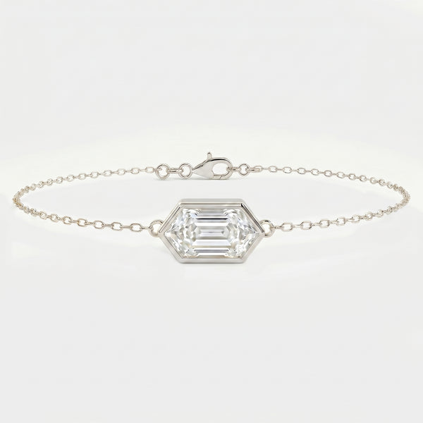 White gold hexagon diamond bracelet with emerald step cut gemstone on delicate minimalist chain