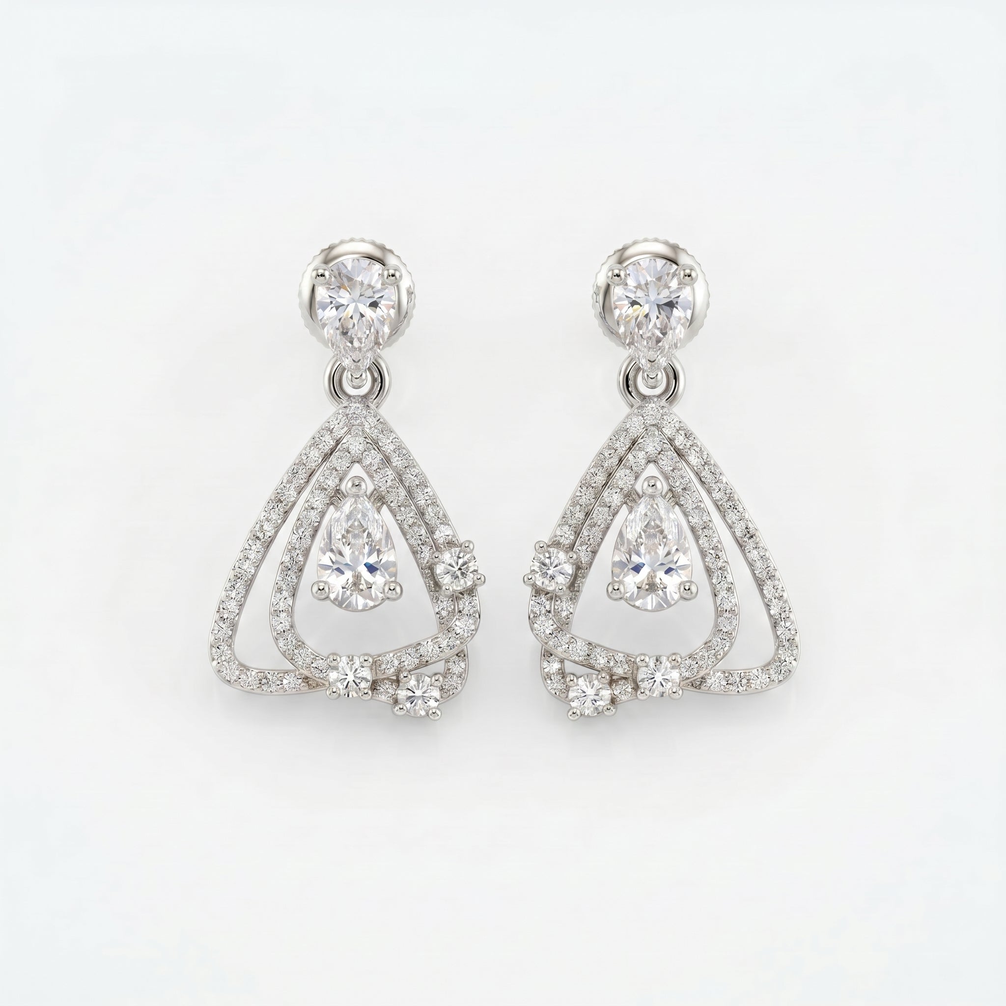 White gold pavé drop earrings with pear-cut stones and elegant geometric open frame design.