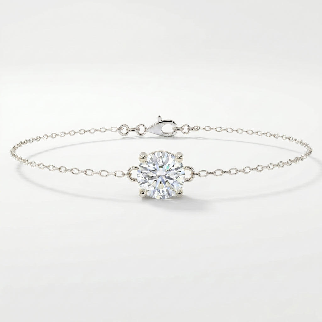 White gold solitaire bracelet with brilliant round gemstone on delicate chain