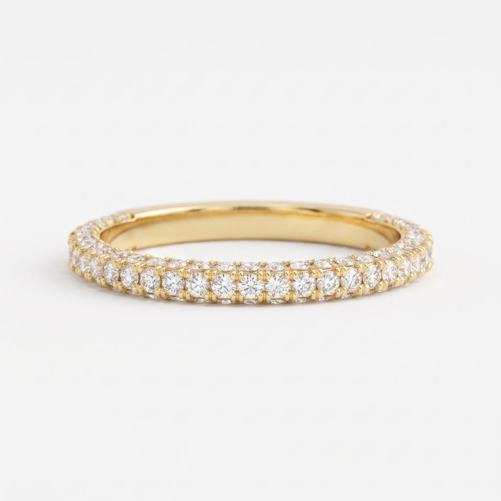 Yellow gold diamond eternity ring with round brilliant diamonds in a full eternity band, luxury wedding and stackable ring.