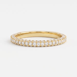 Yellow gold diamond eternity ring with round brilliant diamonds in a full eternity band, luxury wedding and stackable ring.