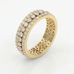Luxury yellow gold eternity ring featuring round brilliant diamonds in a wide three-row setting