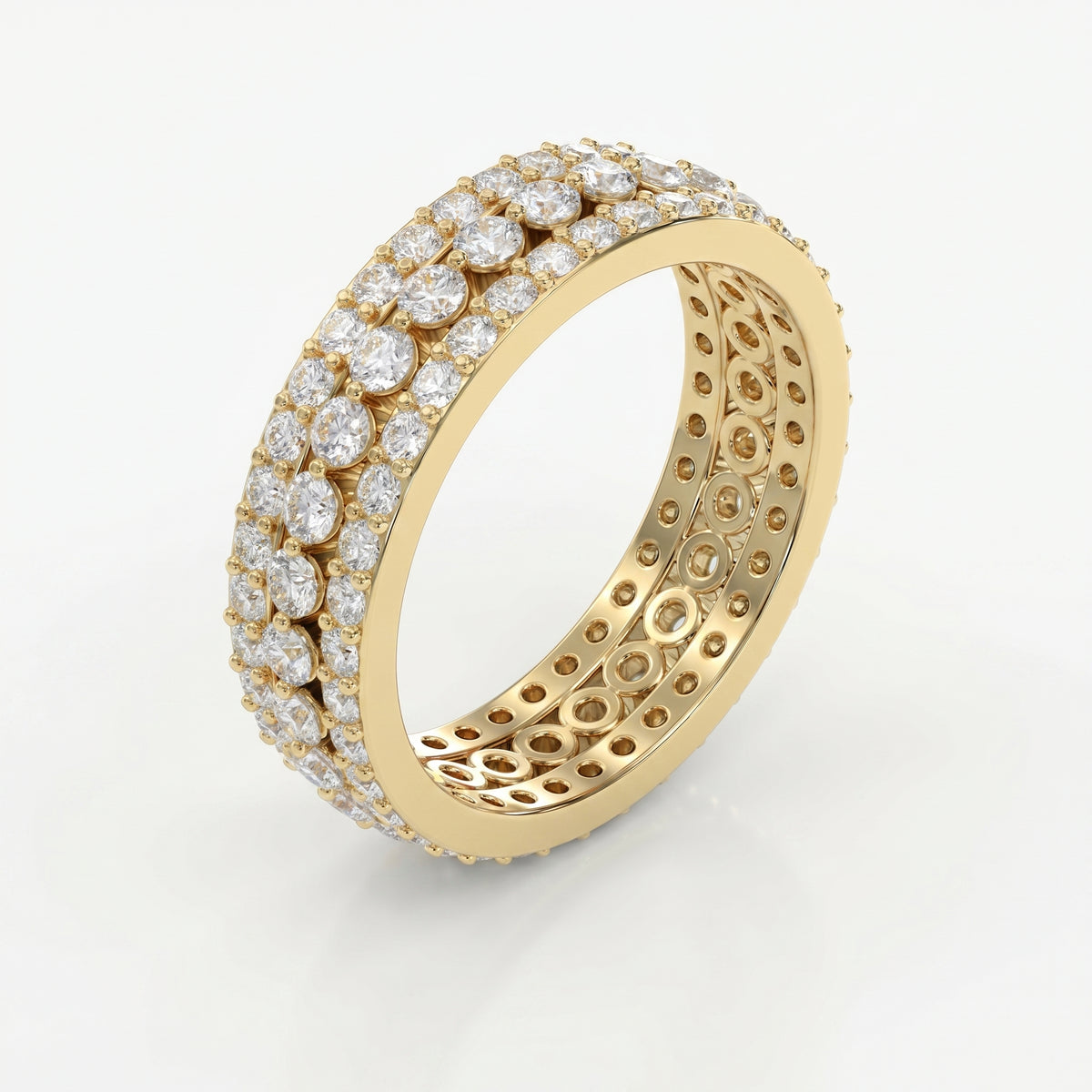 Luxury yellow gold eternity ring featuring round brilliant diamonds in a wide three-row setting
