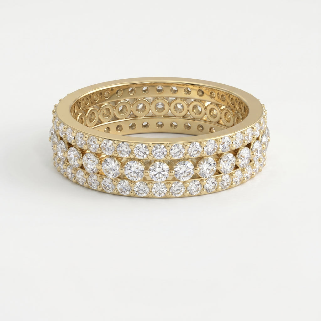Yellow gold diamond eternity band with three rows of round brilliant diamonds on a pure white background