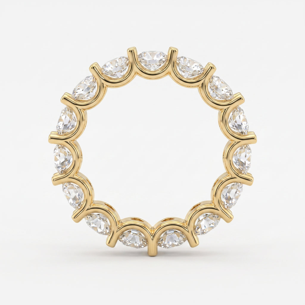 Close-up of round brilliant diamonds in a yellow gold eternity band showcasing sparkle, precision cut, and premium craftsmanship.