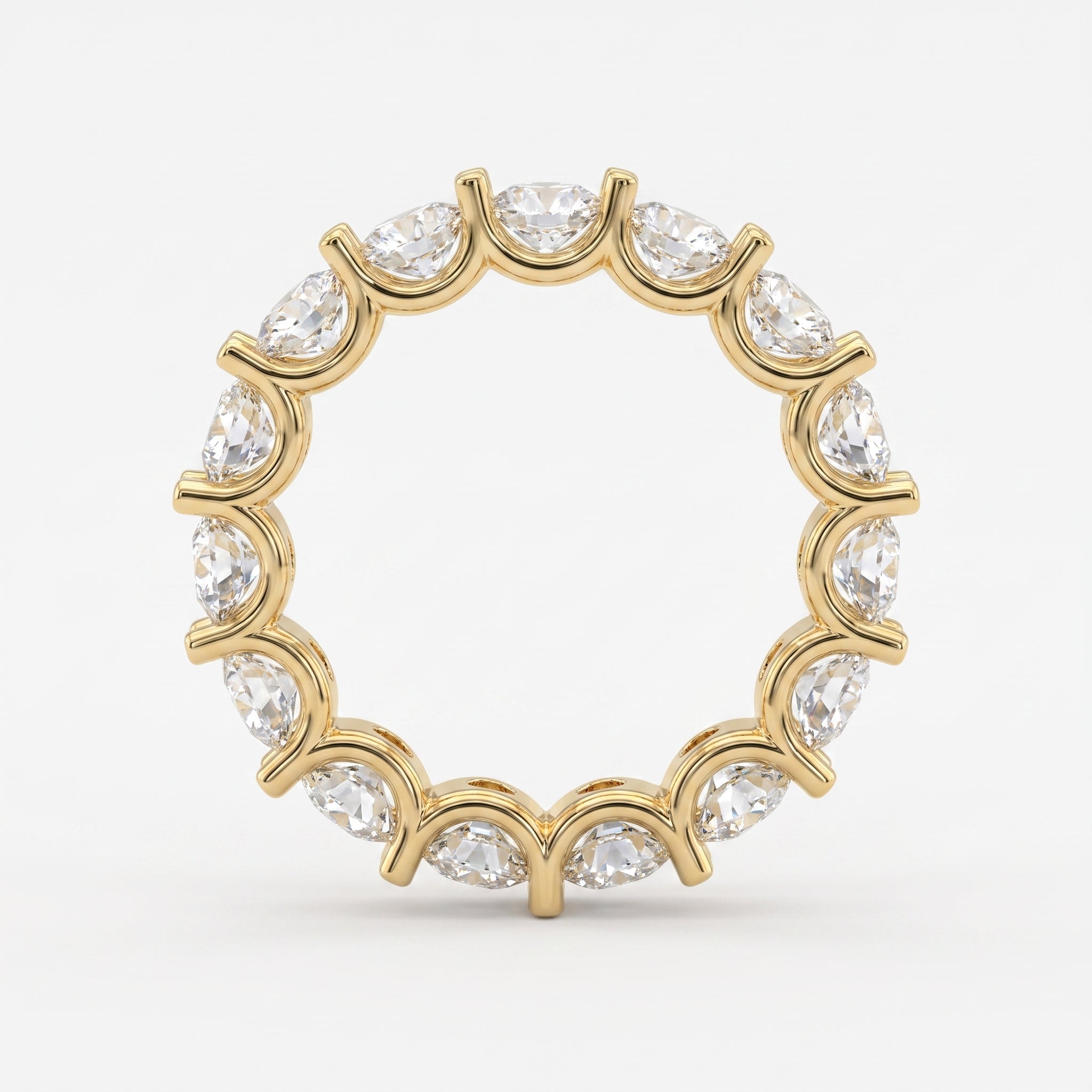 Close-up of round brilliant diamonds in a yellow gold eternity band showcasing sparkle, precision cut, and premium craftsmanship.