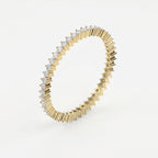 Gold ring with diamond accents on a white background