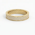 Yellow gold diamond pavé eternity band with brilliant round diamonds in a luxury wide-band design on white background