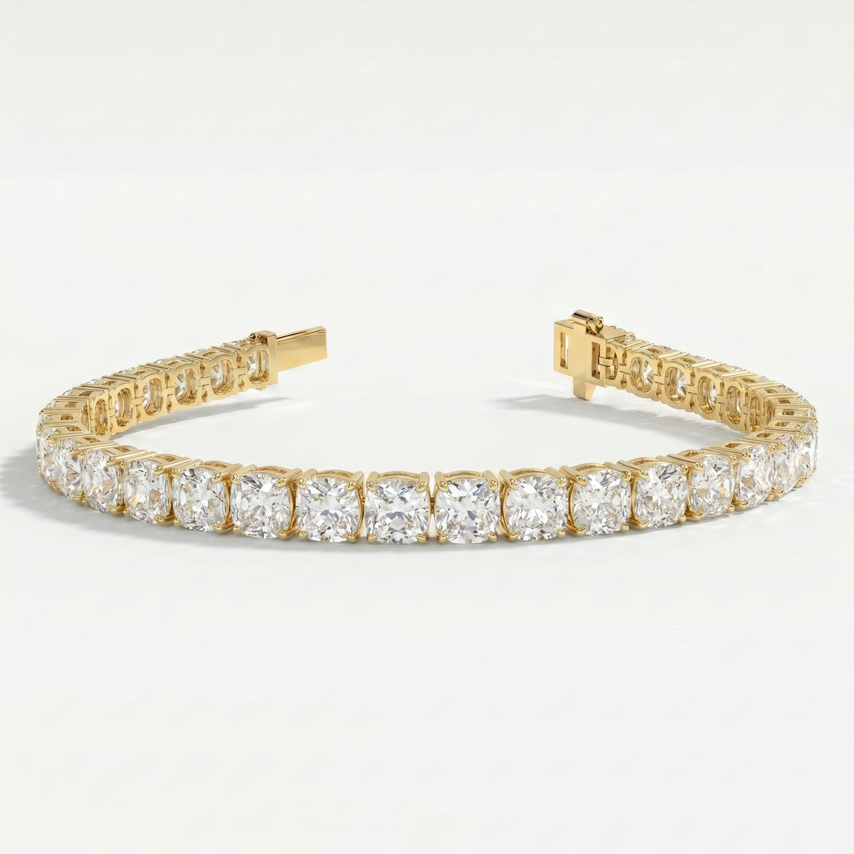 Yellow gold diamond tennis bracelet with open clasp showing secure locking mechanism and luxury jewelry construction.