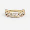 Luxury yellow gold marquise and round diamond wedding band with pavé accents, elegant stacking ring front view