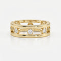 Modern yellow gold open-band diamond ring with bezel-set round diamonds, luxury fine jewelry front view on white background.