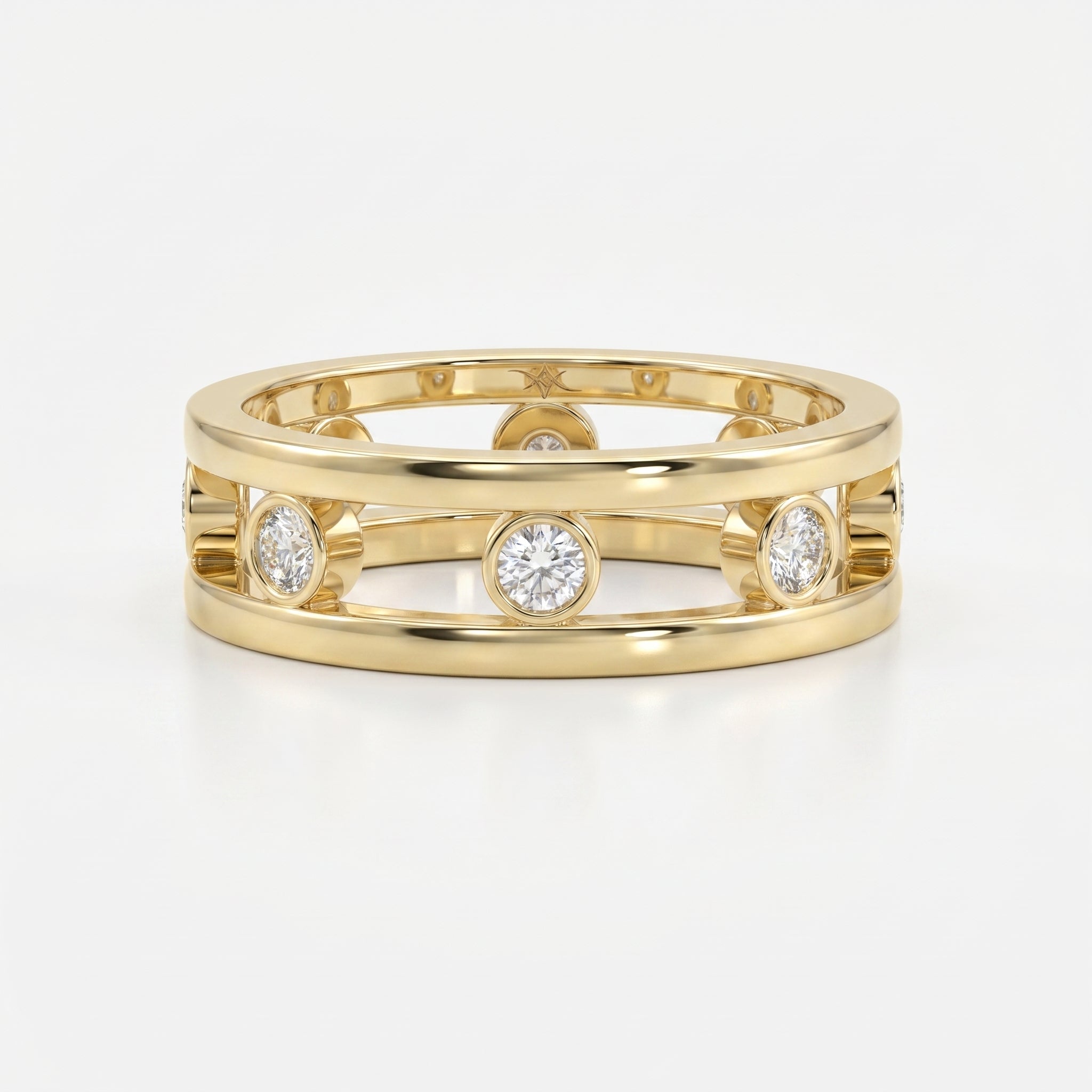 Modern yellow gold open-band diamond ring with bezel-set round diamonds, luxury fine jewelry front view on white background.