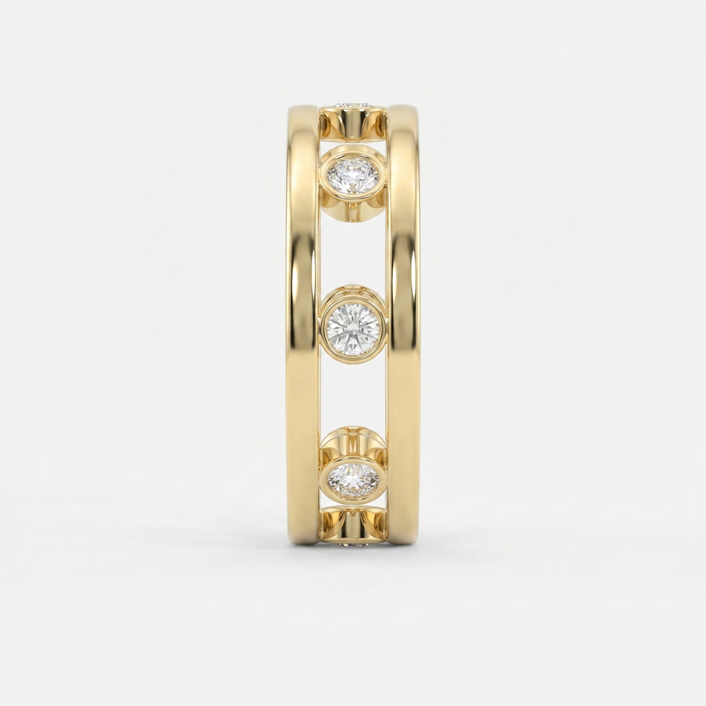 Side profile of yellow gold open-gallery diamond ring highlighting bezel settings and architectural design.