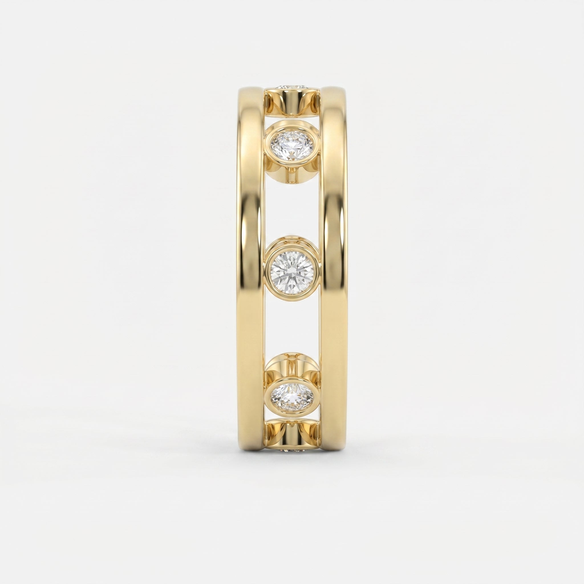 Side profile of yellow gold open-gallery diamond ring highlighting bezel settings and architectural design.
