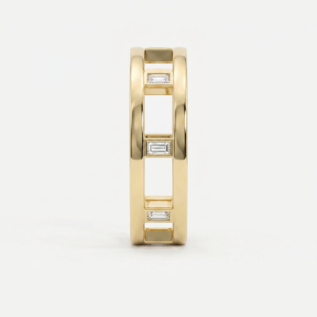 Side profile of yellow gold openwork ring featuring Baguette diamond accents and architectural band design.