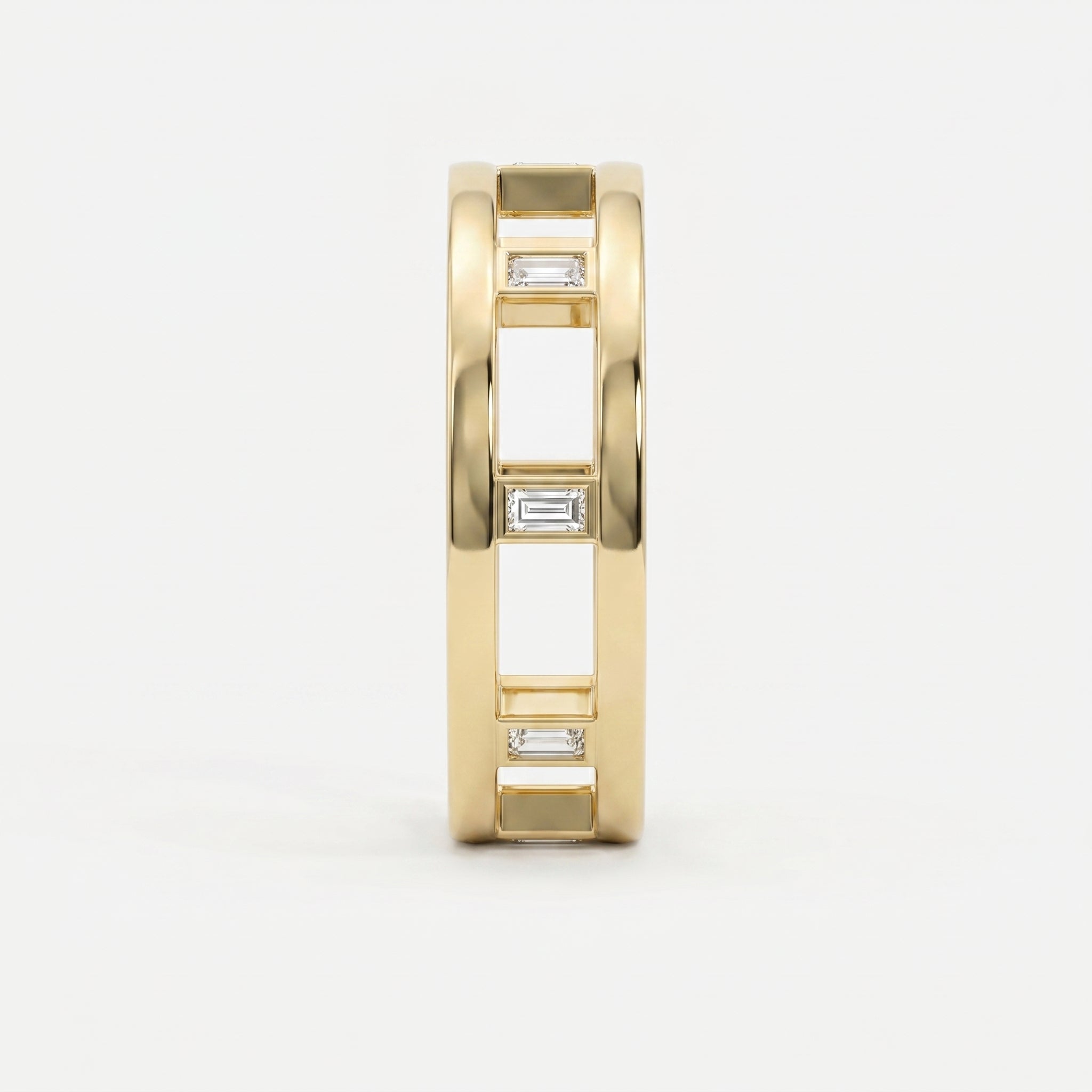 Side profile of yellow gold openwork ring featuring Baguette diamond accents and architectural band design.