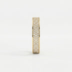 Side profile of yellow gold diamond eternity band showing pavé setting and elegant wide-band construction