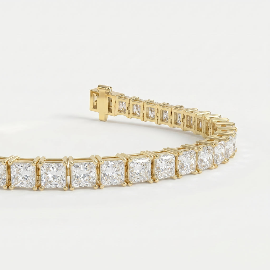 Princess cut diamond tennis bracelet in yellow gold shown at an elegant angle highlighting brilliance and craftsmanship