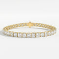 Luxury yellow gold princess cut tennis bracelet with sparkling square diamonds and secure box clasp on white background