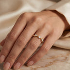 Yellow gold geometric ring styled with stacking bands for a modern layered jewelry look and everyday wear
